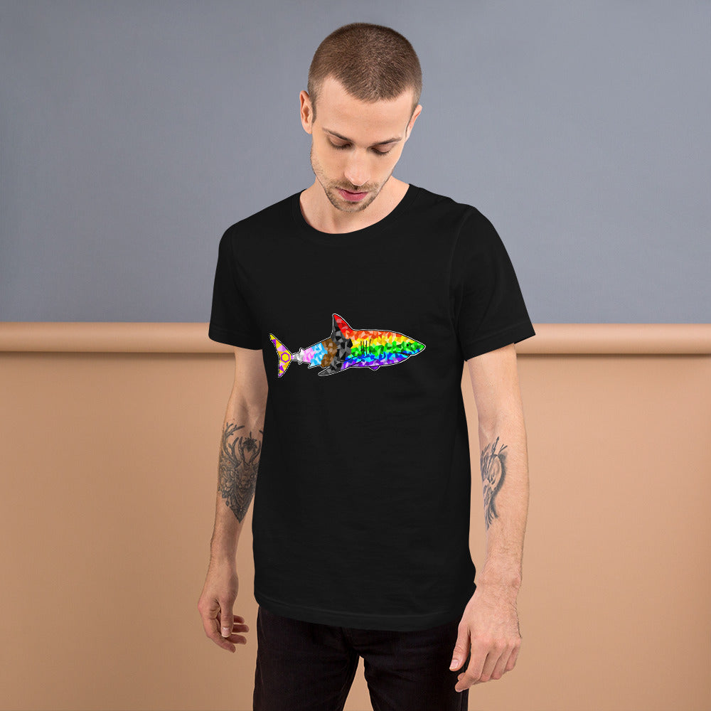 Man wearing a black t-shirt with a geometric progress pride flag design in the shape of a shark